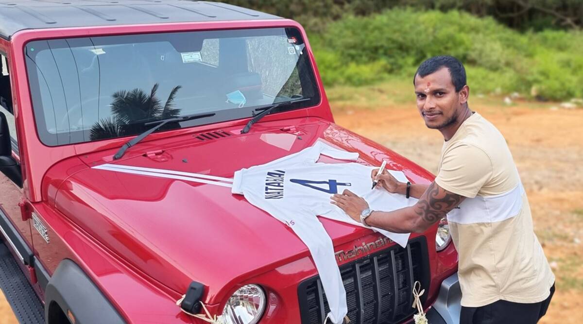T-Natarajan-receives-SUV-thanks-Anand-Mahindra-with-signed-Gabba.jpg T Natarajan receives SUV, thanks Anand Mahindra with signed Gabba jersey in return